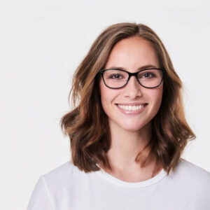 Glasses girl in white t shirt, smiling